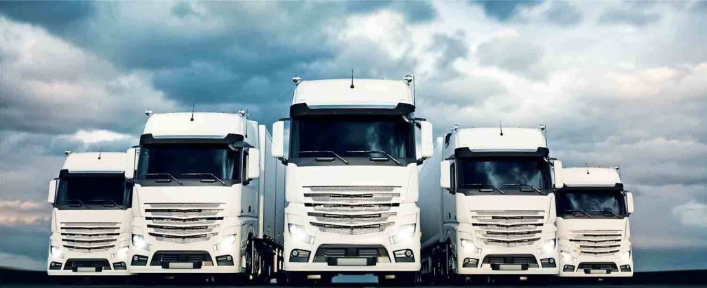 lkw-kartell Bild von fünf weißen Lkws neben einander