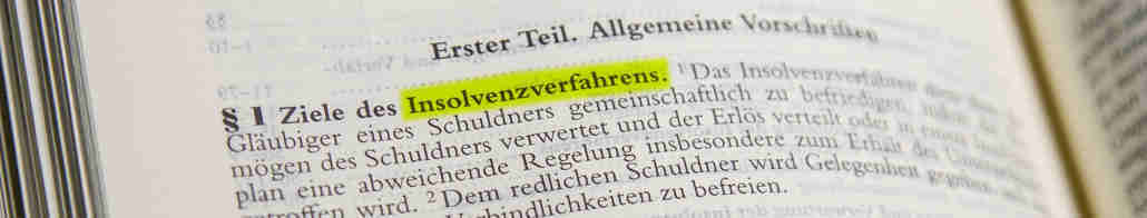 Gesetzbuch aufgeschlagen im Insolvenzrecht
