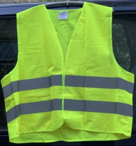 Bild einer gelben Warnweste mit reflektierenden Streifen